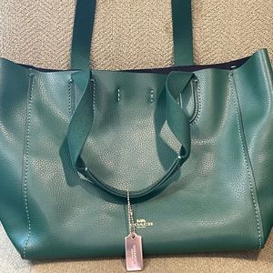 Fun green Coach tote!  One inside zip pocket.  Top is a snap closure.